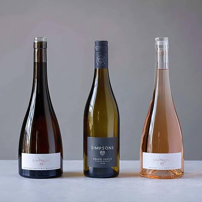 Three bottles of Simpsons wine in a row